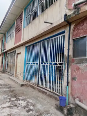 An Acre of Land With a 4 Flat Building With a Bq for Sale