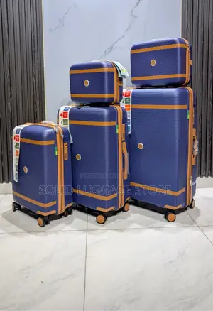 Set of 5 Hard Rubber Traveling Luggage Boxes