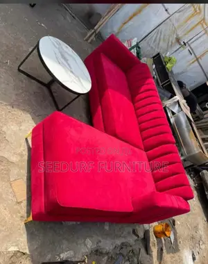 An L Shaped Chair and Center Table Available on Demand