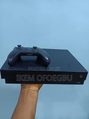 Xbox One X With One Wireless Pad and 10 Games