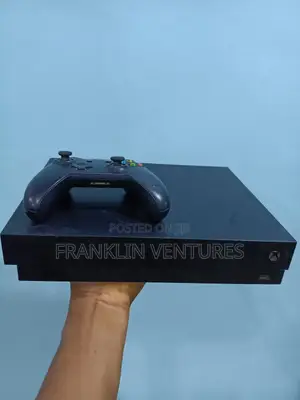 Xbox One X 1tb With One Wireless Pad and 15 Games