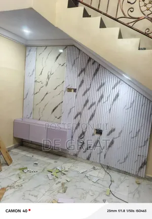 Constructed Tv Console With Wall Panel and Plywood
