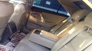 Toyota Camry XLE V6 4dr Sedan (3.5L 6cyl 6AM) 2010 Gold