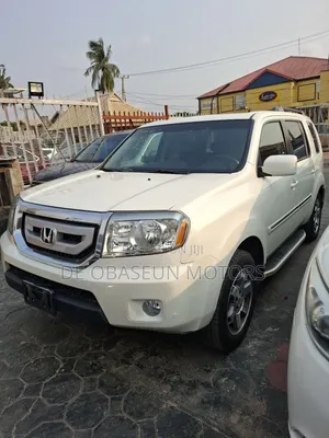 Honda Pilot Touring w/RES/Navi 4WD (3.5L 6cyl 5A) 2011 White