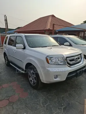 Honda Pilot Touring w/RES/Navi 4WD (3.5L 6cyl 5A) 2011 White