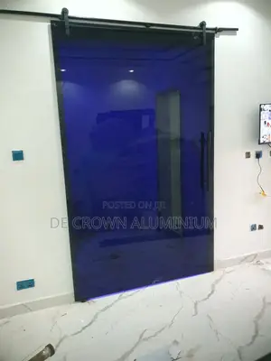 Luxury Frameless Sliding Glass Door – 10mm Grey Glass | Lekki, Ikoyi.