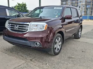 Honda Pilot Touring w/RES/Navi 4WD (3.5L 6cyl 5A) 2013 Burgundy