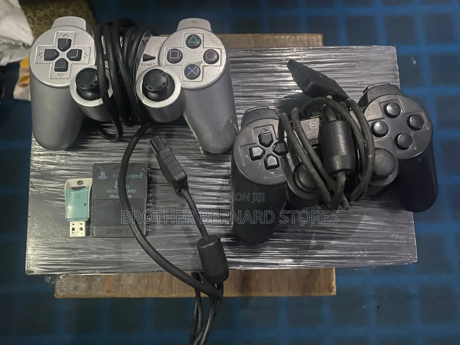 Ps 2 With 2 Pads and 5 Games