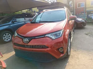 Toyota RAV4 Limited 4dr SUV AWD (2.5L 4cyl 6A) 2015 Orange