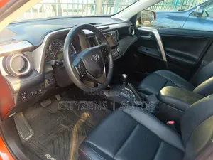 Toyota RAV4 Limited 4dr SUV AWD (2.5L 4cyl 6A) 2015 Orange