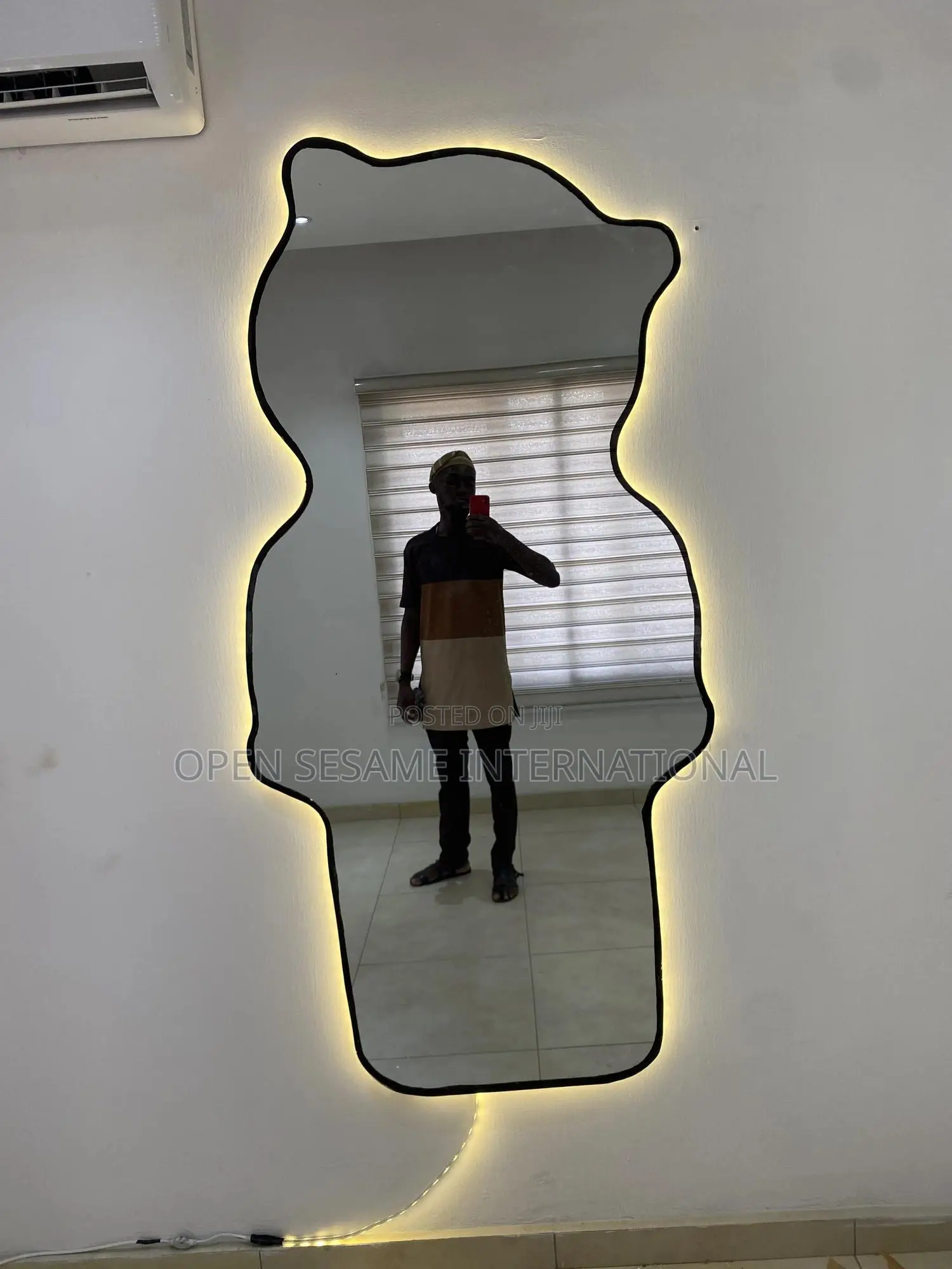A Teddy Bear Shaped Mirror With Lights