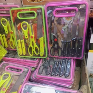 Generic Set of Kitchen Knives, Scissors and Chopping Board