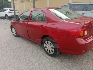 Toyota Corolla LE 4dr Sedan (1.8L 4cyl 4A) 2010 Red