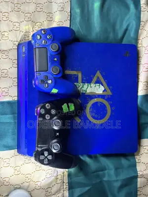 Ps4 Slim (Blue Limited Edition)+ 2 Controllers With 10 Games Installed