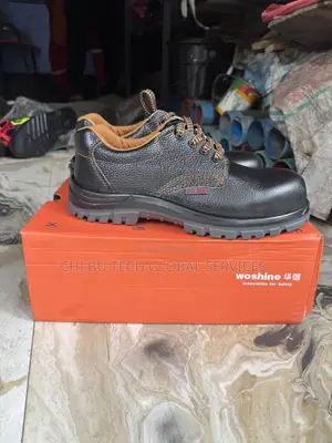Woshine Safety Shoes With Orange Contrast Stitching And Laces.