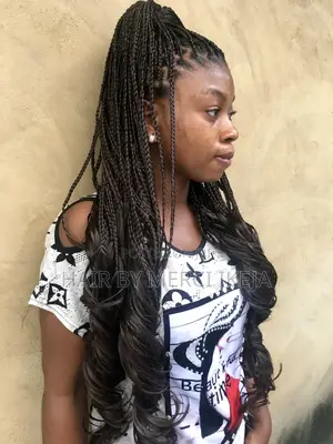 “Knotless Box Braids With Beads – Mid-Back Length”