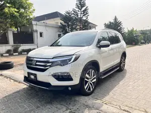 Honda Pilot Touring 4dr SUV 4WD (3.5L 6cyl 9A) 2017 White