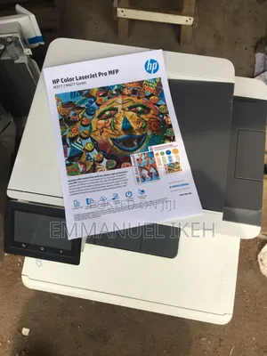 Hp Laserjet Mfp477 D.I Machine Strictly Direct Tokunbo