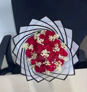 Description: Stems Red Roses With Fillers in-Between Bouquet