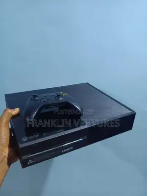 Xbox One With 15 Games and One Wireless Pad