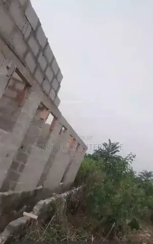 Land and an Ongoing Four Self Contain Apartment