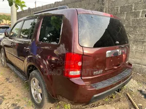 Honda Pilot EX-L 4dr SUV (3.5L 6cyl 5A) 2011 Red