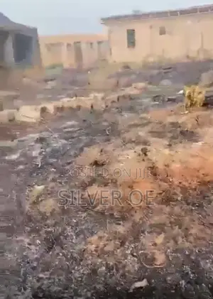 100 by 100 Plot With a Building Half Roof on the Land for Sale