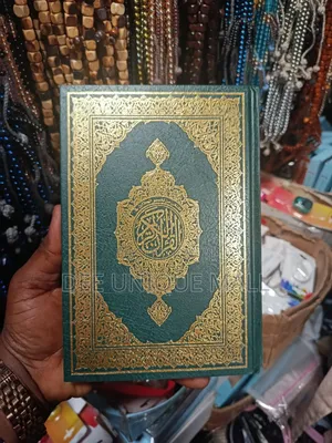 Quran With Arabic Text,Translation and Transliterations. 3 in 1