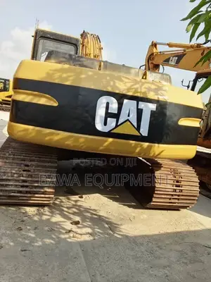 1999, 2002 and 2005 Cat Excavator 320bl