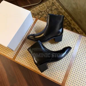 Heeled Leather Ankle Boot in Black