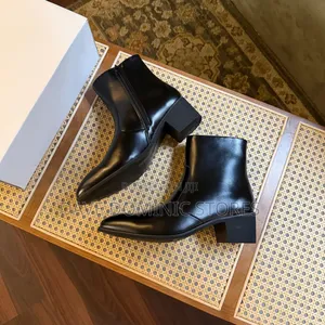 Heeled Leather Ankle Boot in Black