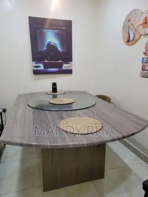 Very Durable Dinner Table Without the Glass at the Middle.