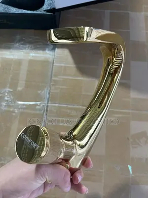 A Quality Gold Finished Basin Mixer Tap .