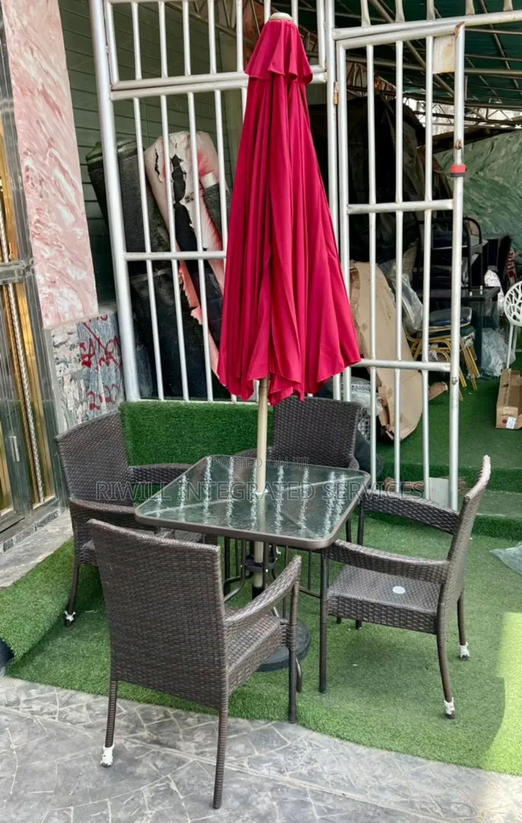Four Chairs, Table and Umbrella