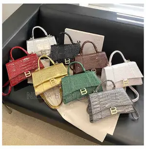 Balenciaga Hourglass Top-Handle Bag.