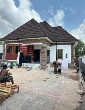 Black PVC Gutter and Black Patch Shingle