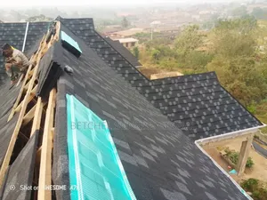 Installation of Shingle Designs Black and Black Patch