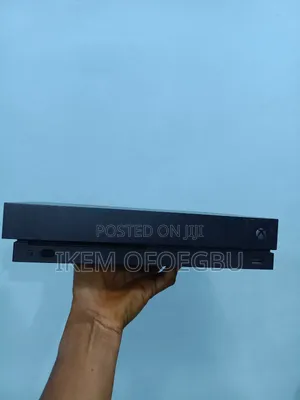 Xbox One X With 10 Games and 2 Wireless Pad