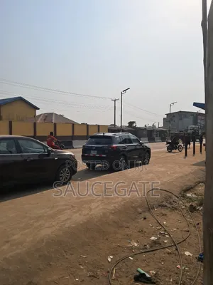 Land Busy Road at Abuleado Satellite Old Ojo Road Next to Zenith Bank