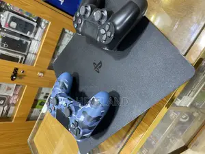 Uk Clean Used Ps4 Console (With Two Pads)