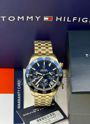 Original Tommy Hilfiger Blue Dial Gold Steel Chain Available Instore
