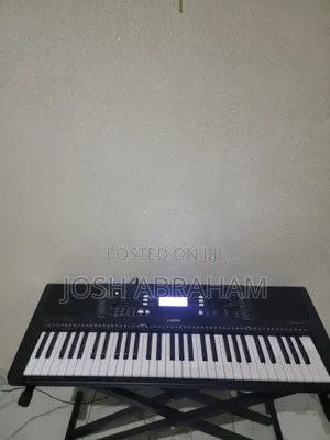 Still New Yamaha PSR E373