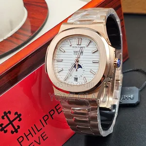 Patek Philippe Nautilus White Dial Gold Wristwatch
