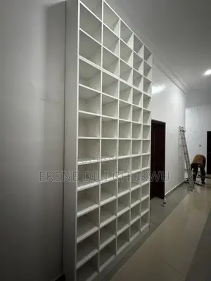 Custom Floor-to-Ceiling Shoe Rack With Multiple Compartments