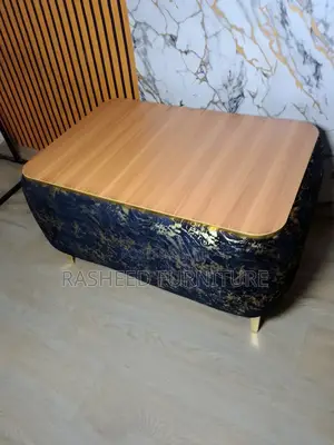 Modern Upholstered Center Table 32 by 22 Inches Top