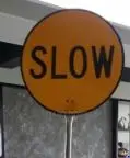 Traffic Slow Sign