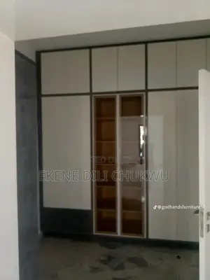 Luxury Full-Height Inbuilt Wardrobe With Glass Display Island Unit