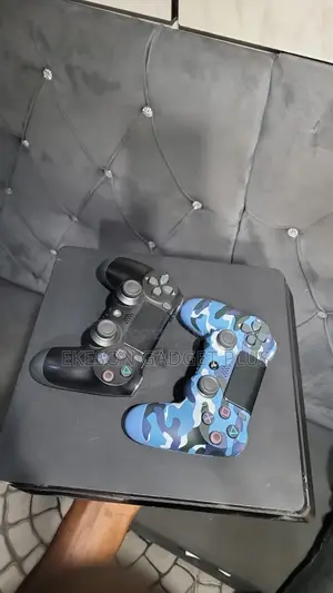 Used Ps4 Slim With 2 Pads and 12games Fc26