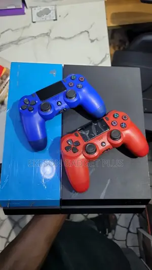 Used Ps4 Fat With2pads and 12games Fc26