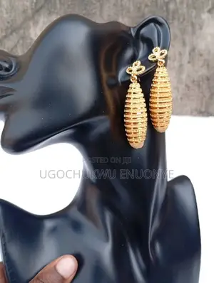 Long Gold Textured Drop Earrings